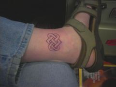 This is the first knot I know I want.  In think picture it's drawn on my ankle in sharpie about height I think I want the anklet to be.
My ankle is 9 3/4 inches around and I think the tattoo should be 1 3/4 inches to 2 inches high maximum.