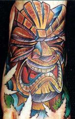 tiki design
I really like this.  The eyes would need to be open some though.  That actually changes the meaning of the tiki.
I really like the 3-d look of this.
